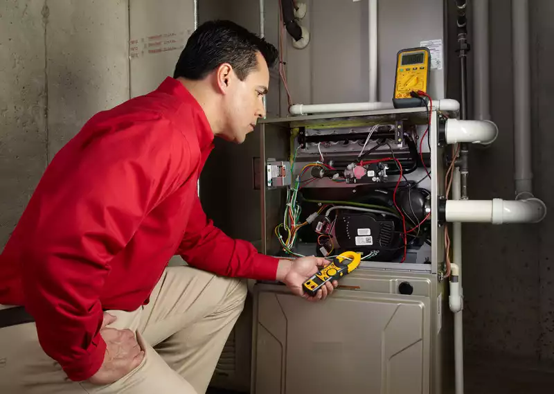 service tech testing furnace