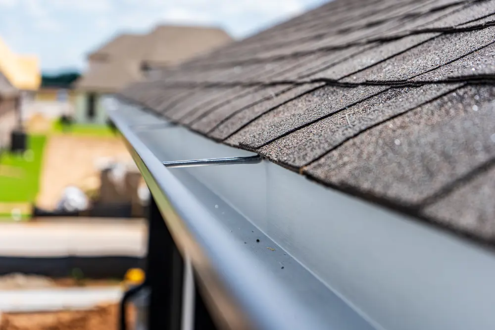 Looking for durable, energy-efficient roofing? See our expert team in action in "metal-roof.webp" as we provide professional metal roof installation, ensuring long-lasting protection for your home.