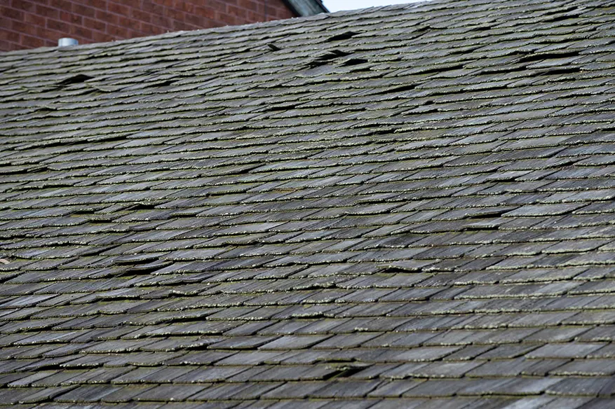 Shingles damaged due to storms and weather